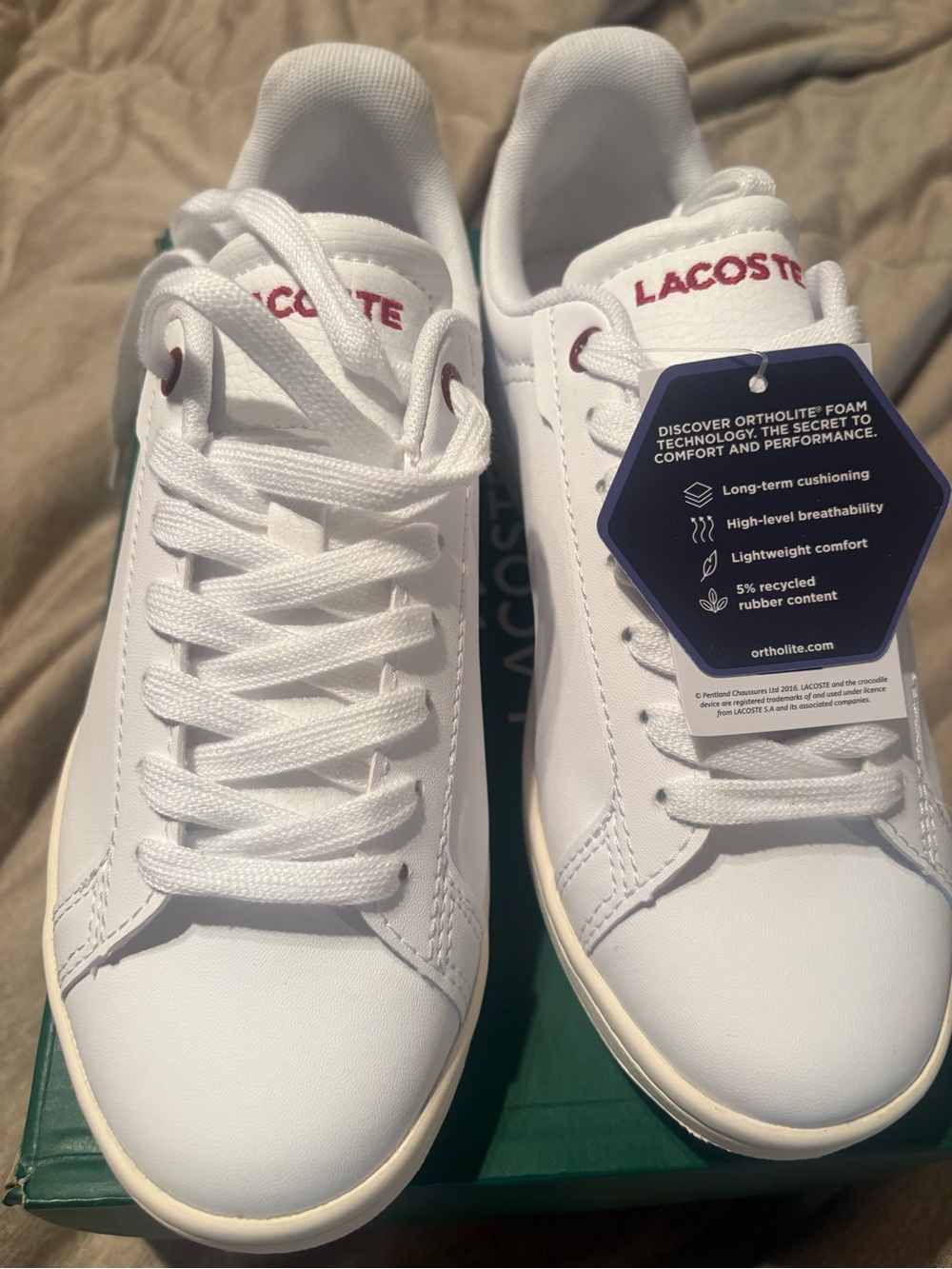 Lacoste White Sneakers with Red Logo Accents